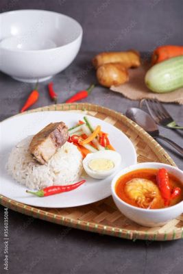  Nasi Dagang: ¡Un festín aromático de arroz pegajoso y curry de pescado que te transportará a las costas de Terengganu!